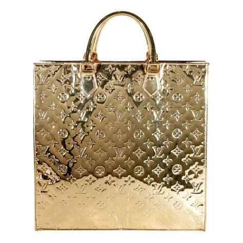 louis vuitton bag gold plate